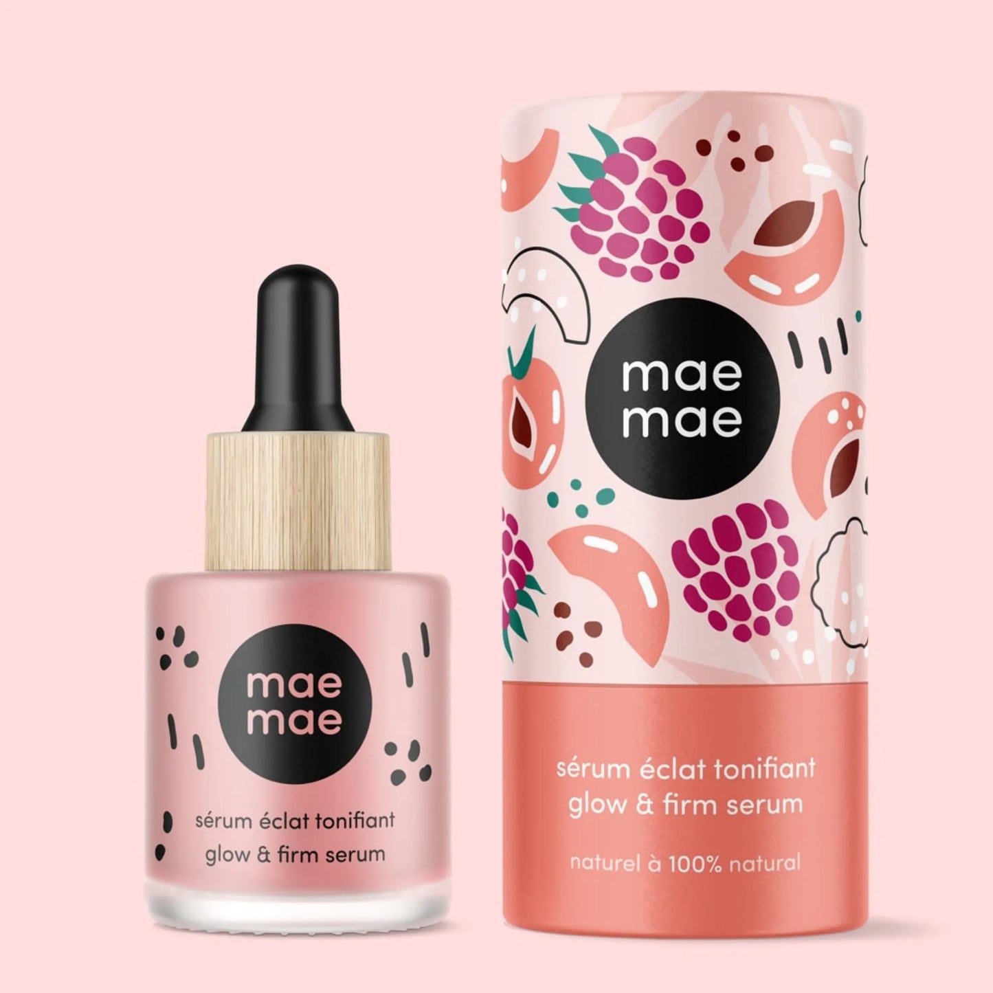Sérum éclat tonifiant abricot et framboise mae mae présenté avec son étui sur fond rose