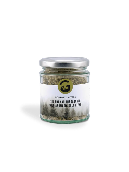 Pot de sel aromatique sauvage Gourmet Sauvage sur fond blanc, assaisonnement aux algues de la Gaspésie et champignons forestiers du Québec